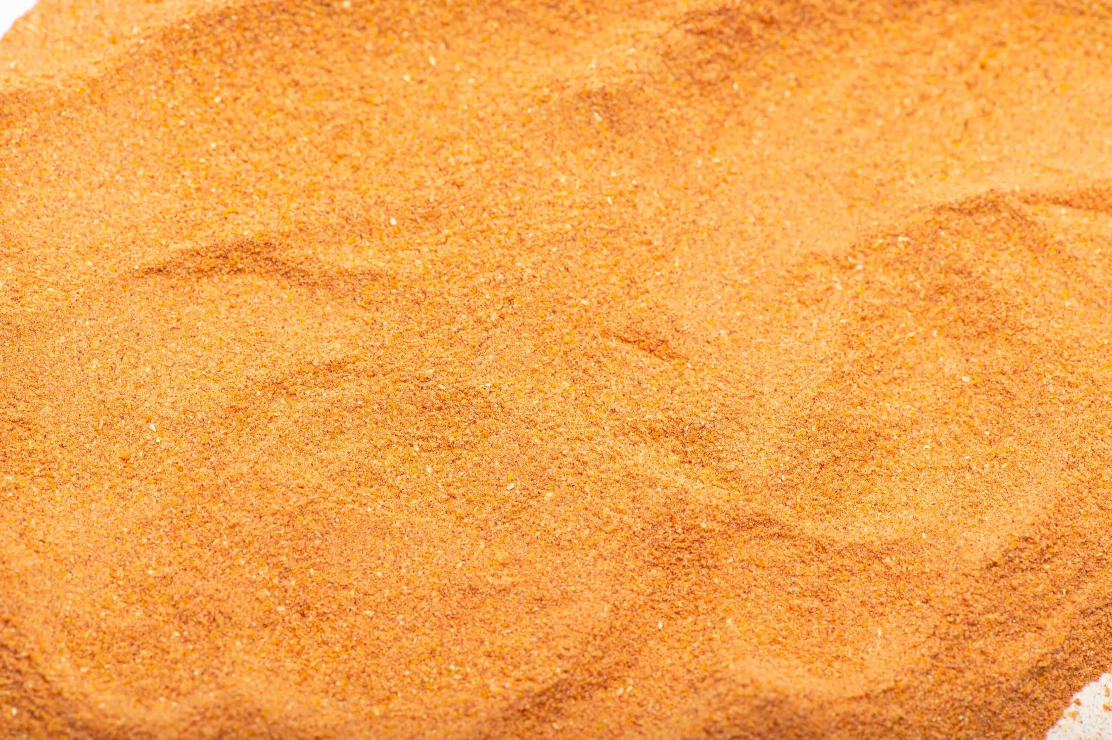 Detailed view of the Reddy Red Organic Superfood Powder with focus on visible particles of cranberry and acai, highlighting the natural sources of antioxidants.