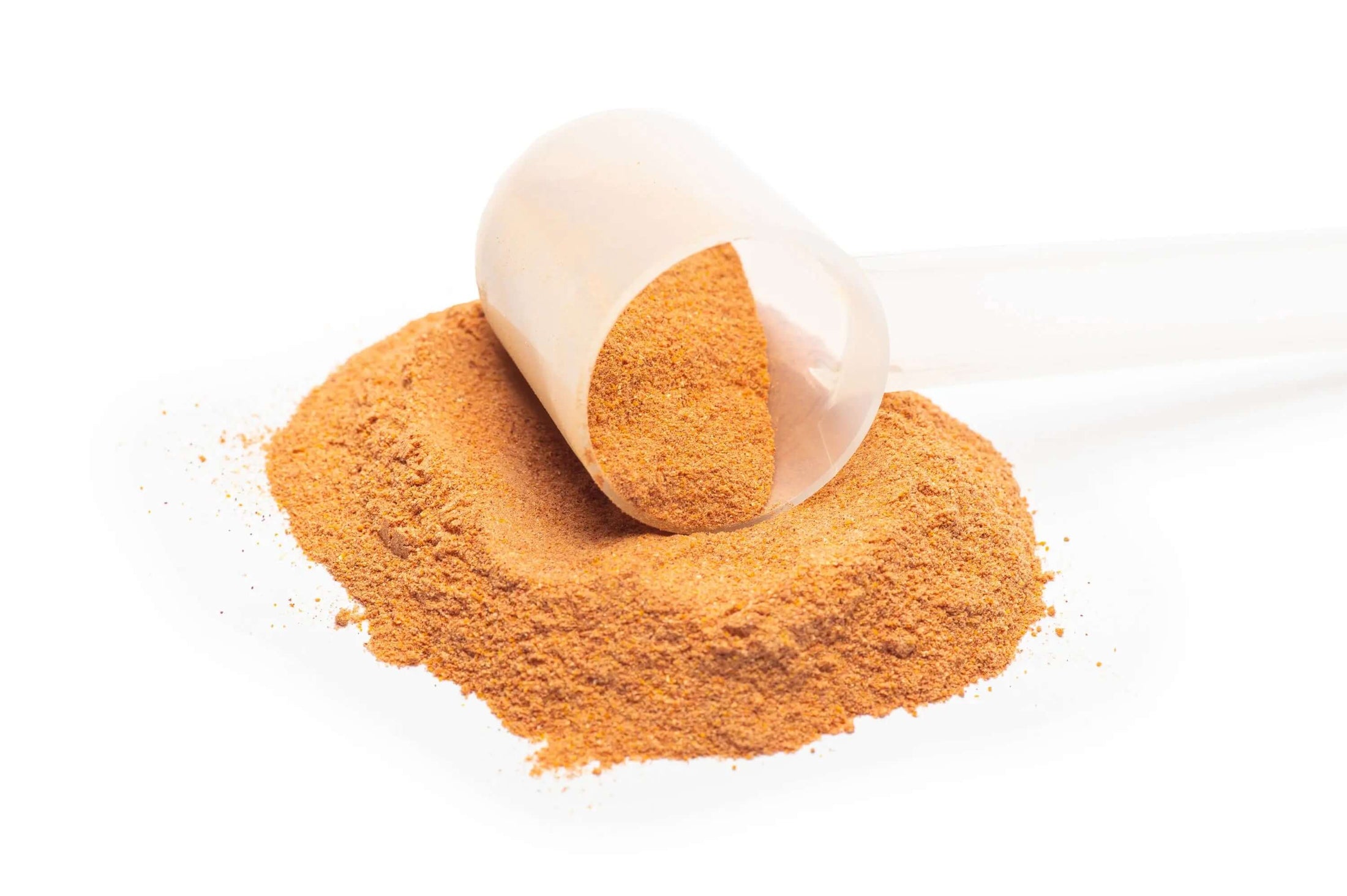 Close-up image showing the fine texture of Reddy Red Organic Superfood Powder in a clear glass jar, emphasizing its rich, vibrant red color derived from natural ingredients like beetroot and pomegranate.