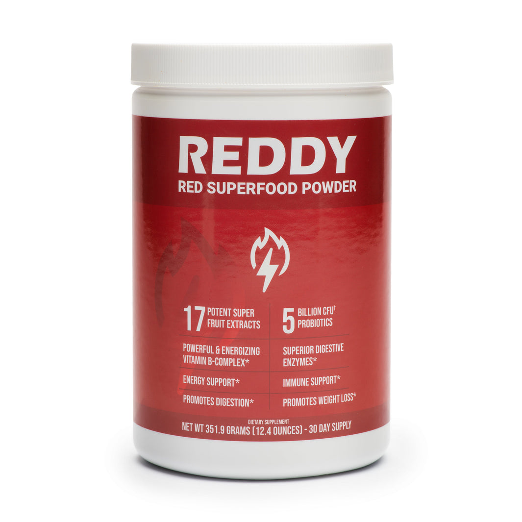 Array of red superfoods around a Reddy Red Powder container.