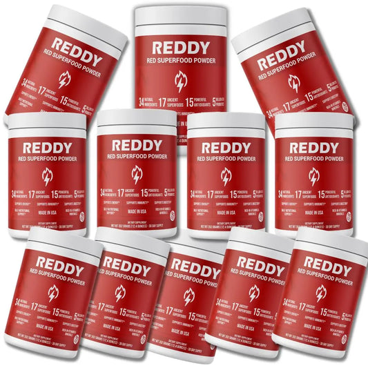 Twelve bottles of Reddy Red Organic Superfood Powder arranged to showcase the bulk pack, ideal for dedicated users committed to long-term health and wellness benefits.